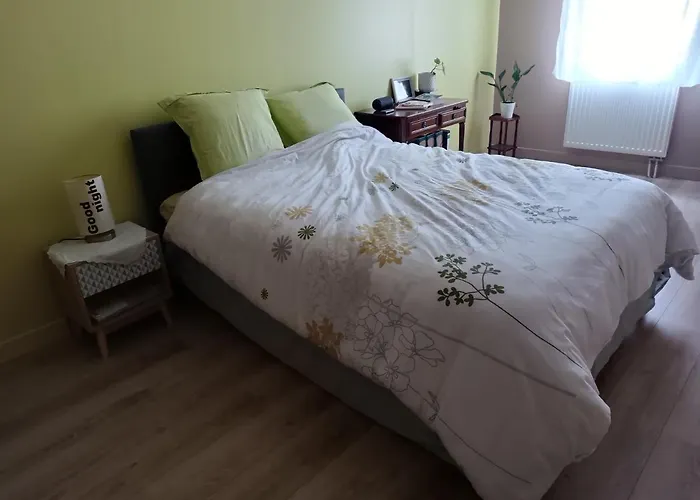 Quarto em Acomodações Particulares Maison Au Calme A