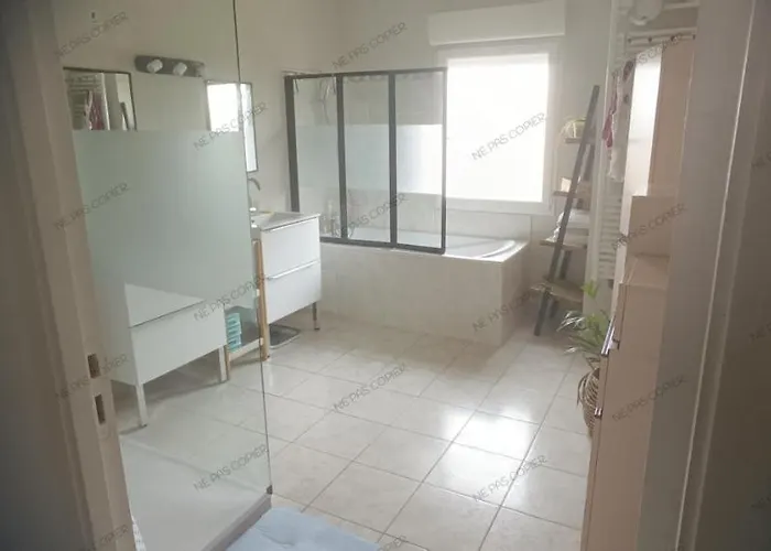 Quarto em Acomodações Particulares Maison Au Calme A *